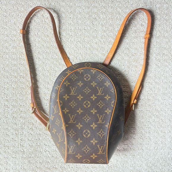 Louis Vuitton Brown and Tan Monogram Backpack - Picture 1 of 13